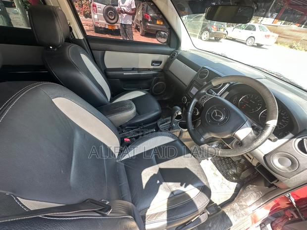 Mazda Verisa 2011 Red