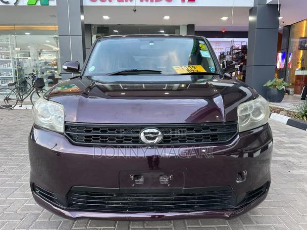 Toyota Corolla Rumion 2011 Maroon