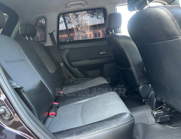 Mazda Verisa 2010 Burgundy