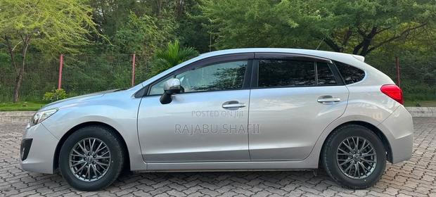 Subaru Impreza 2.0i Limited PZEV 4dr Hatchback AWD (2.0L 4cyl CVT) 2014