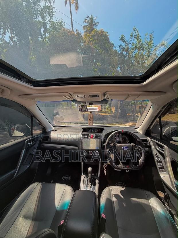 Subaru Forester 2.0XT Touring 4dr SUV AWD (2.0L 4cyl Turbo CVT) 2014