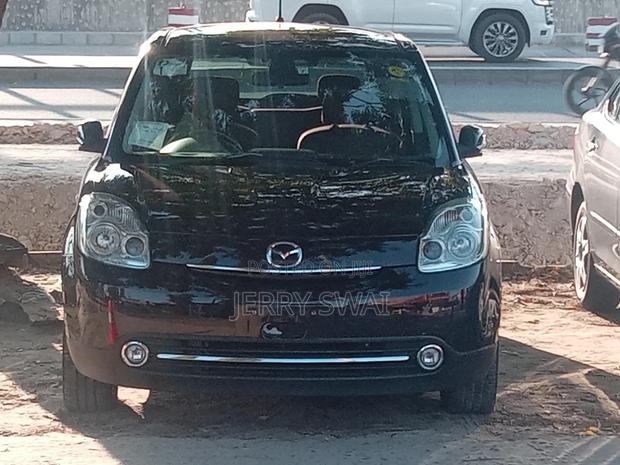 Mazda Verisa 2009 Maroon