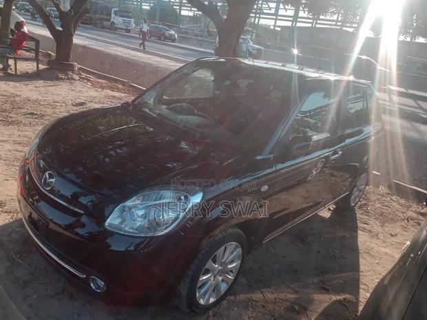 Mazda Verisa 2009 Maroon