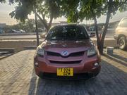 Toyota IST 2009 Maroon for sale