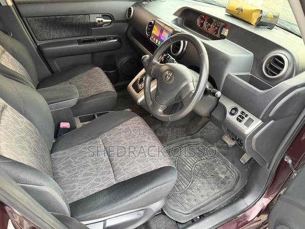 Toyota Corolla Rumion 2010 Maroon