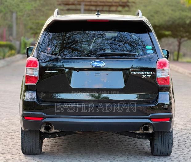 Subaru Forester 2.0XT Touring 4dr SUV AWD (2.0L 4cyl Turbo CVT) 2014