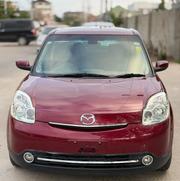Mazda Verisa 2009 Maroon for sale