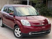 Mazda Verisa 2012 Maroon for sale